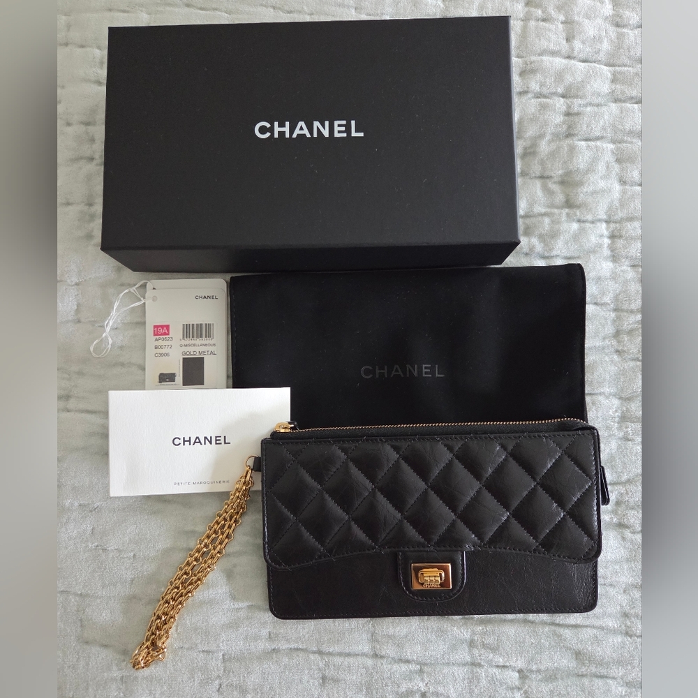 Chanel black quilted pouch with chain